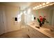 Elegant bathroom with double sinks, marble shower, and modern fixtures at 3960 Dart Dr, Pahrump, NV 89060