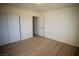 Spacious bedroom with double doors and adjacent bathroom at 3960 Dart Dr, Pahrump, NV 89060