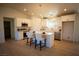 Modern kitchen with white cabinets and stainless steel appliances at 3960 Dart Dr, Pahrump, NV 89060