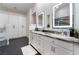 Elegant bathroom with double vanity and large mirrors at 4182 Bottiglia Ave, Las Vegas, NV 89141