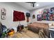 Teen bedroom with wood floor and a bed at 4182 Bottiglia Ave, Las Vegas, NV 89141