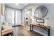 Bright and airy entryway with a modern bench and console table at 4182 Bottiglia Ave, Las Vegas, NV 89141