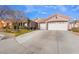 Two-car garage and well-maintained front yard at 4182 Bottiglia Ave, Las Vegas, NV 89141