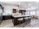 Gourmet kitchen featuring granite countertops and custom cabinetry at 4182 Bottiglia Ave, Las Vegas, NV 89141