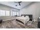 Relaxing main bedroom with plush carpet and a large window with shutters at 4182 Bottiglia Ave, Las Vegas, NV 89141