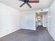 Bright bedroom with ceiling fan and carpet flooring at 4955 Lindell Rd # 119, Las Vegas, NV 89118