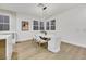 Bright dining room featuring a marble table, modern chairs, and a stylish light fixture at 517 Annet St, Henderson, NV 89052