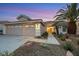 Charming single-story home with landscaped yard and two-car garage at 517 Annet St, Henderson, NV 89052