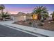 Beautiful curb appeal with landscaping and a three-car garage at 517 Annet St, Henderson, NV 89052