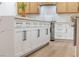 Modern kitchen island with white cabinets and quartz countertops at 517 Annet St, Henderson, NV 89052