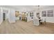 Modern kitchen with island and adjacent dining area at 517 Annet St, Henderson, NV 89052