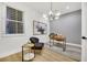 Home office with wood desk and modern chair at 517 Annet St, Henderson, NV 89052