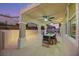 Spacious covered patio with ceiling fan and outdoor seating at 517 Annet St, Henderson, NV 89052