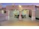 Covered patio with dining table and ceiling fan at 517 Annet St, Henderson, NV 89052