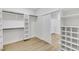 Spacious walk-in closet with custom shelving and drawers at 517 Annet St, Henderson, NV 89052