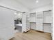 Bright walk-in closet with built-in shelving and drawers at 517 Annet St, Henderson, NV 89052