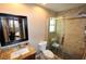 Bathroom with a walk-in shower and granite countertop at 5508 Big Sky, Las Vegas, NV 89149