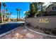 Entrance to Villa Trinidad community with signage and landscaping at 5508 Big Sky, Las Vegas, NV 89149