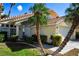 Two-story house with tile roof, palm trees, and a two-car garage at 5508 Big Sky, Las Vegas, NV 89149