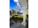 Landscaped front yard with a white column and shrubs at 5508 Big Sky, Las Vegas, NV 89149