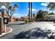 Gated entrance to community with intercom and landscaping at 5508 Big Sky, Las Vegas, NV 89149