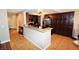 Kitchen with granite countertops and dark wood cabinets at 5508 Big Sky, Las Vegas, NV 89149