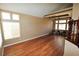 Living room with hardwood floors, high ceiling, and large windows at 5508 Big Sky, Las Vegas, NV 89149