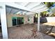 Covered patio with stamped concrete flooring and access to the backyard at 5508 Big Sky, Las Vegas, NV 89149