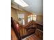 View from upstairs looking down at the grand entryway and staircase at 5508 Big Sky, Las Vegas, NV 89149