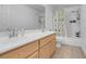 Bathroom with double vanity, shower/tub combo, and tile floor at 553 Sinfold Park St, Las Vegas, NV 89148