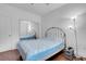 Bedroom features wood floor, mirrored closet and great natural light from the window at 553 Sinfold Park St, Las Vegas, NV 89148