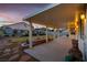 Inviting covered patio with ample space for lounging and outdoor dining at 553 Sinfold Park St, Las Vegas, NV 89148