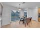 Kitchen dining area with sliding glass doors leading to the backyard at 553 Sinfold Park St, Las Vegas, NV 89148