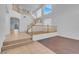 Bright foyer with staircase, tile entry, and hardwood flooring at 553 Sinfold Park St, Las Vegas, NV 89148