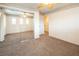 Bedroom featuring a mirrored closet door, ceiling fan and neutral decor at 575 Dusty Palms Ln, Henderson, NV 89052