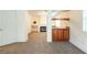 Main bedroom with carpet, wet bar and fireplace at 575 Dusty Palms Ln, Henderson, NV 89052