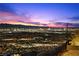 Breathtaking panoramic view of the city skyline at twilight from this hillside location at 577 Overlook Rim Dr, Henderson, NV 89012