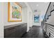 Modern hallway with dark cabinetry and large artwork at 577 Overlook Rim Dr, Henderson, NV 89012