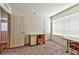 Bedroom with double closets and large window at 6046 Castle Gardens Ave, Las Vegas, NV 89130