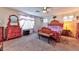 Main bedroom with wooden furniture and ceiling fan at 6046 Castle Gardens Ave, Las Vegas, NV 89130