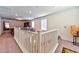 Upstairs hallway with white railing overlooking the main floor at 6046 Castle Gardens Ave, Las Vegas, NV 89130