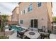 Backyard with pool, patio furniture, and house view at 6050 Belvedere Canyon Ave, Las Vegas, NV 89139