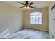 Bright bedroom with ceiling fan and large window at 6050 Belvedere Canyon Ave, Las Vegas, NV 89139