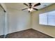 Bedroom with ceiling fan and window coverings at 6050 Belvedere Canyon Ave, Las Vegas, NV 89139