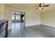 Bright living room with hardwood floors and fireplace at 6050 Belvedere Canyon Ave, Las Vegas, NV 89139