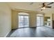 Living room with hardwood floors and balcony access at 6050 Belvedere Canyon Ave, Las Vegas, NV 89139