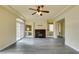 Living room with hardwood floors, built-in fireplace at 6050 Belvedere Canyon Ave, Las Vegas, NV 89139