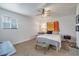 Bright bedroom with carpeted floor and window coverings at 628 L, Boulder City, NV 89005