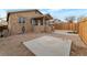 View of the stone front of the house with small porch and small yard, creating a cozy curb appeal at 628 L, Boulder City, NV 89005