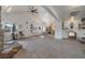 Open living area with kitchen and stone fireplace at 628 L, Boulder City, NV 89005